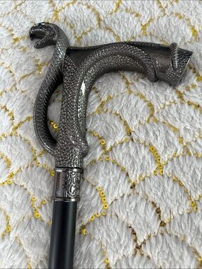 Snake-Handled Walking Cane - Gunmetal Black with hidden steel dagger inside.